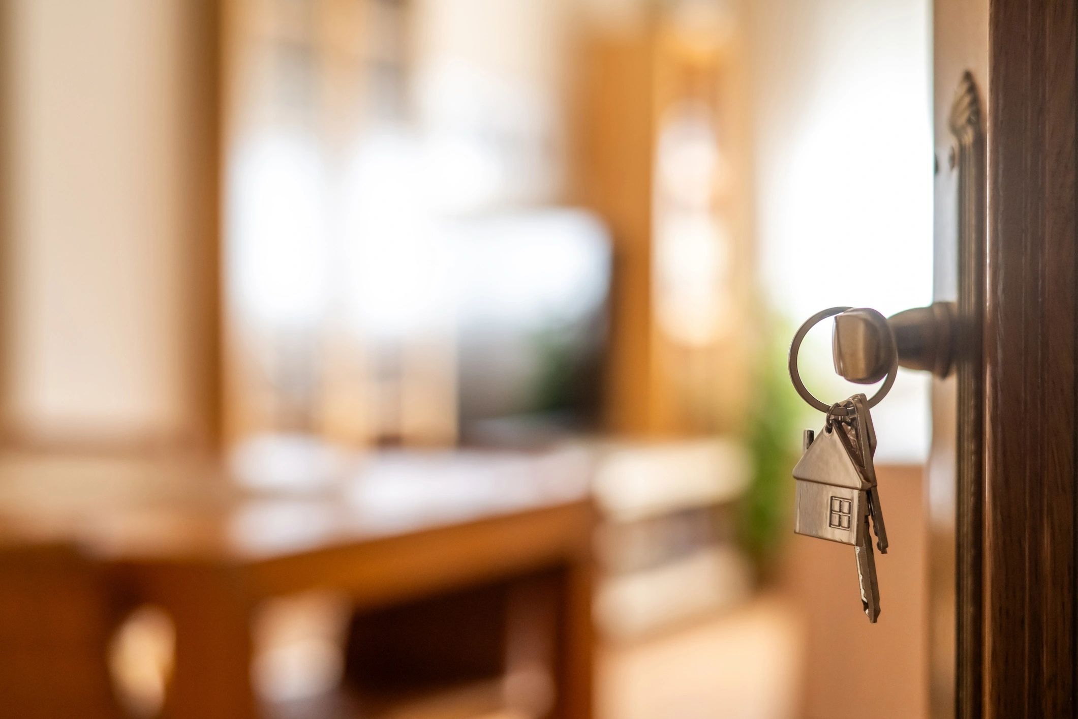 House keys hanging in a new home door